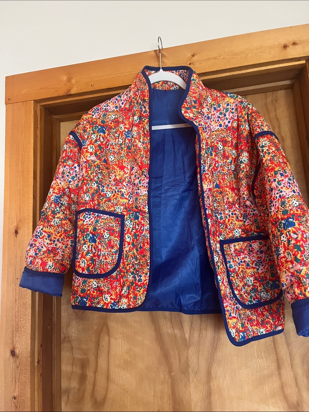 Bright Floral Quilted Jacket with Blue Trim